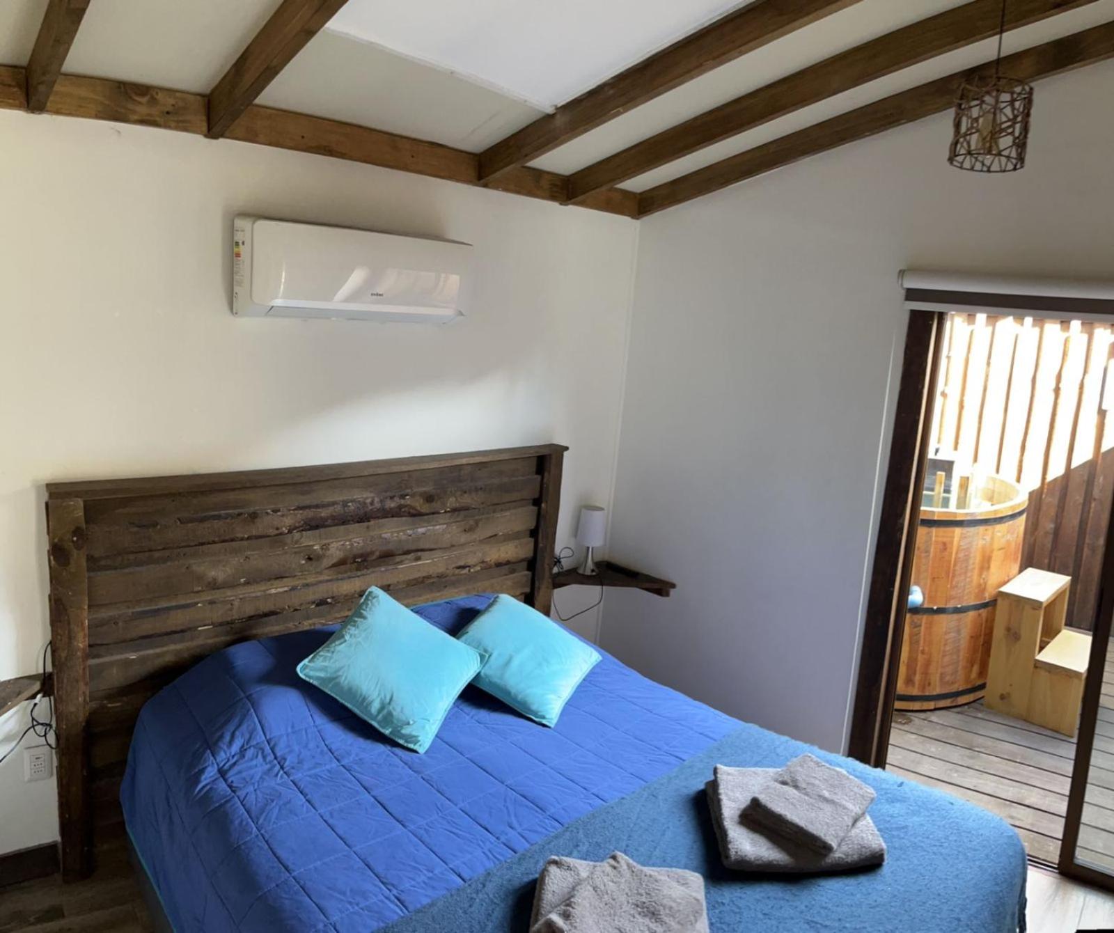 Cayumanque bedroom with wooden beams